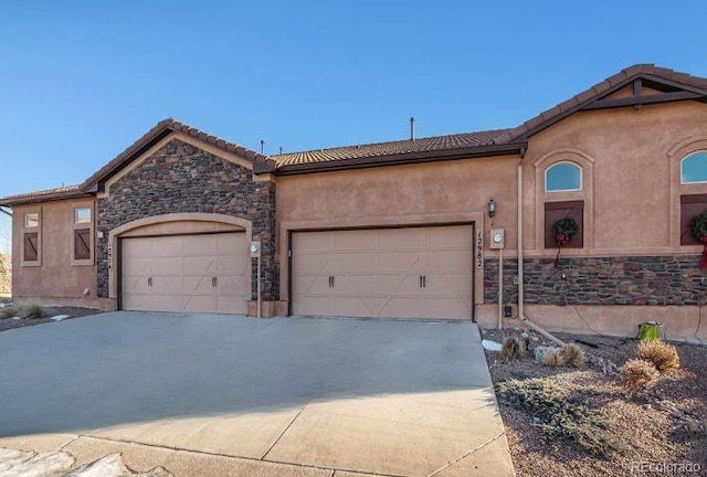 view of front of home with a garage