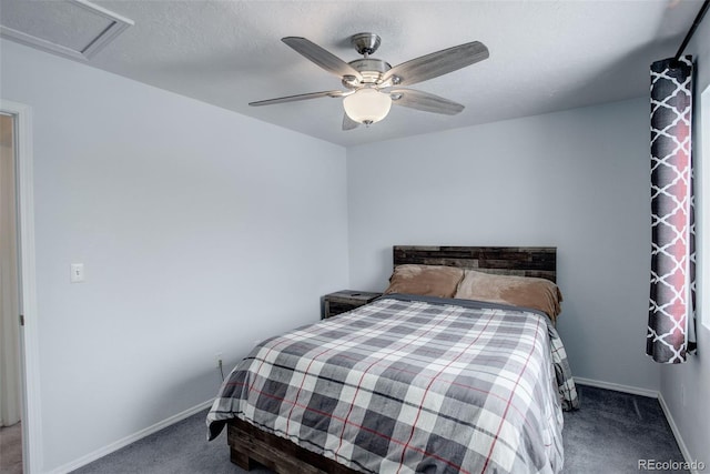 bedroom with ceiling fan, a textured ceiling, and carpet floors