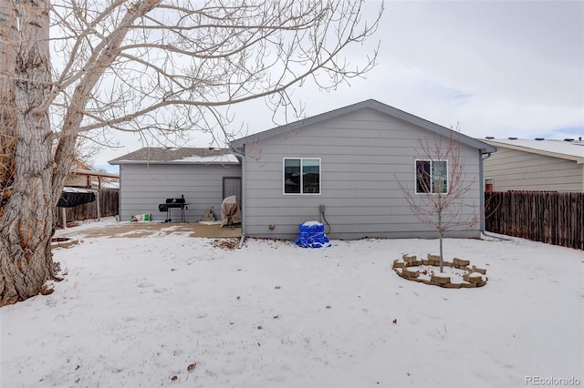 view of snow covered property