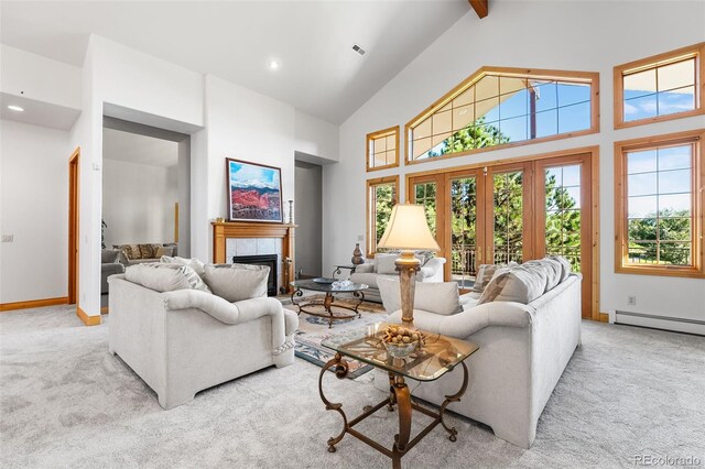 carpeted living room featuring high vaulted ceiling, a tiled fireplace, a baseboard radiator, and beamed ceiling