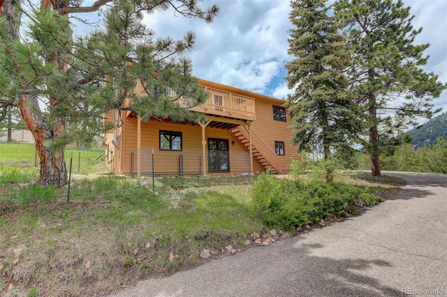 31150 Manitoba Dr, Evergreen, CO 80439 - view of front of home with a deck and stairway