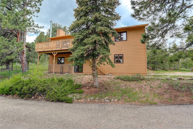31150 Manitoba Dr, Evergreen, CO 80439 - view of front of property with a deck