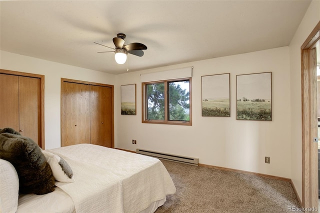 31150 Manitoba Dr, Evergreen, CO 80439 - bedroom featuring a baseboard radiator, carpet, multiple closets, and ceiling fan