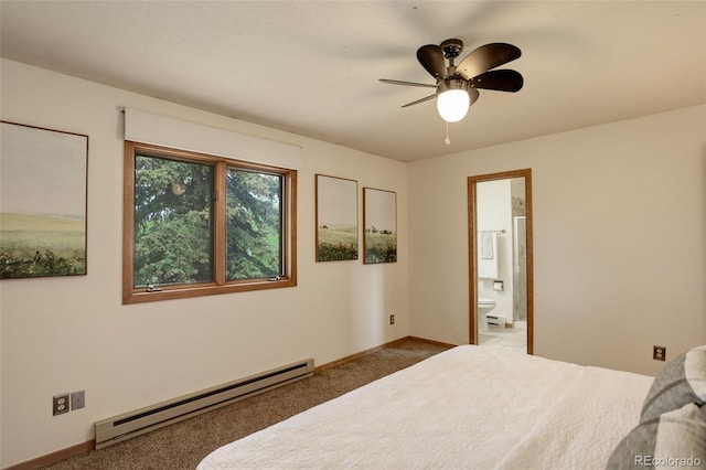 31150 Manitoba Dr, Evergreen, CO 80439 - carpeted bedroom featuring baseboard heating and connected bathroom