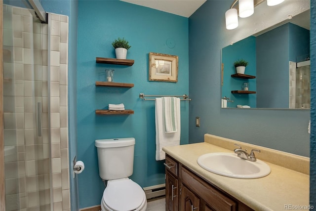 31150 Manitoba Dr, Evergreen, CO 80439 - bathroom with vanity, a baseboard radiator, and a tile shower