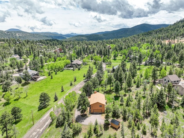 31150 Manitoba Dr, Evergreen, CO 80439 - aerial view of a heavily wooded area and mountains