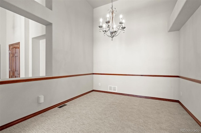 1513 Cannon Mountain Dr, Longmont, CO 80503 - unfurnished room with carpet floors, a chandelier, and baseboards