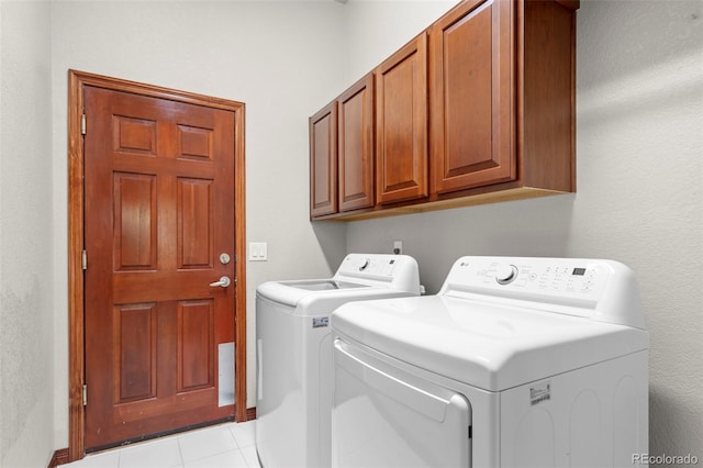 1513 Cannon Mountain Dr, Longmont, CO 80503 - laundry room featuring washer and clothes dryer and cabinet space