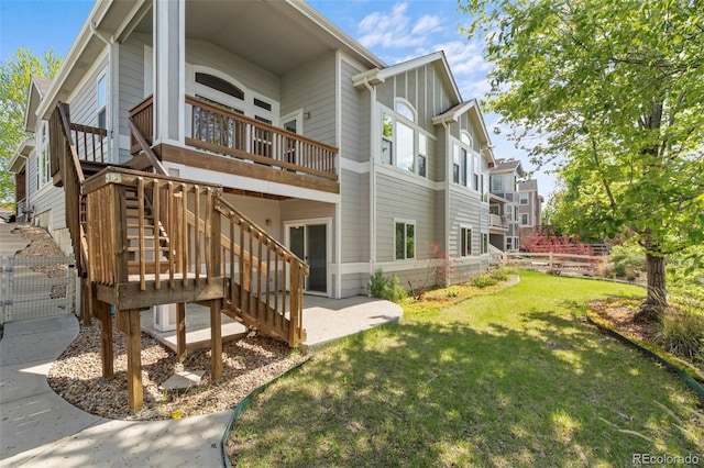 1513 Cannon Mountain Dr, Longmont, CO 80503 - rear view of property featuring a wooden deck and stairway