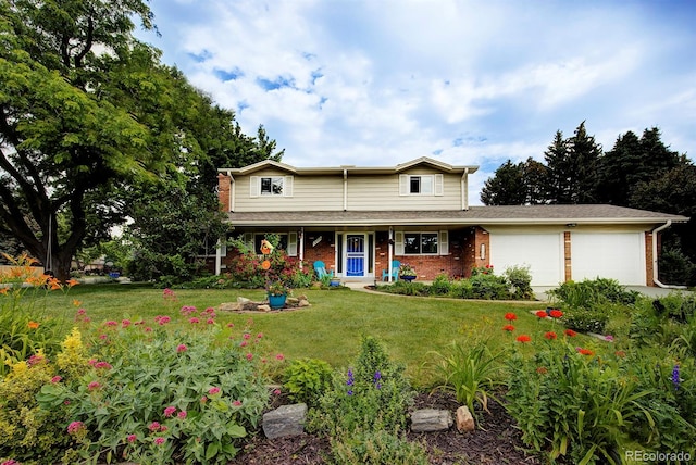 10373 W 75th Ave, Arvada, CO 80005 - traditional home with an attached garage, a front yard, brick siding, and a porch