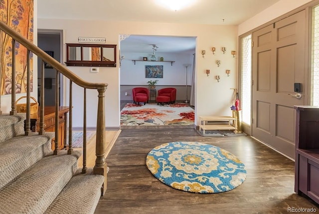 10373 W 75th Ave, Arvada, CO 80005 - entryway featuring stairway and wood finished floors