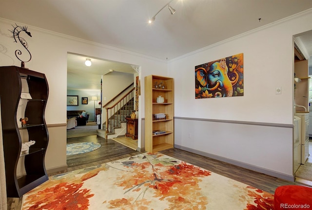 10373 W 75th Ave, Arvada, CO 80005 - entryway featuring wood finished floors, ornamental molding, and stairs