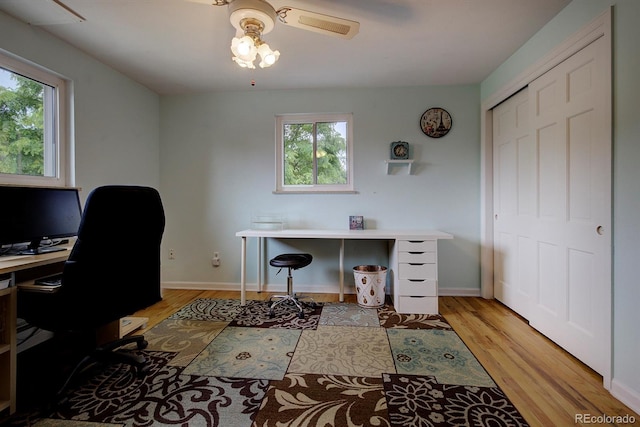 10373 W 75th Ave, Arvada, CO 80005 - office space featuring light wood-type flooring and ceiling fan