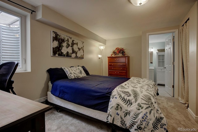 10373 W 75th Ave, Arvada, CO 80005 - bedroom featuring carpet floors and ensuite bathroom
