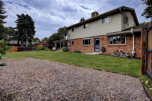 10373 W 75th Ave, Arvada, CO 80005 - back of house with brick siding