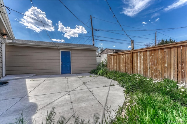 view of patio with fence