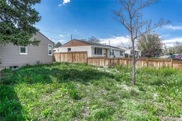 view of yard featuring fence
