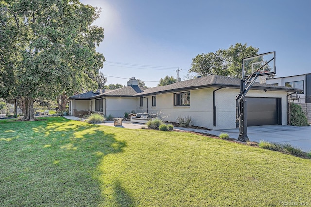 3695 E Dartmouth Ave, Denver, CO 80210 - rear view of property featuring driveway, a lawn, brick siding, a chimney, and a garage