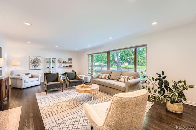3695 E Dartmouth Ave, Denver, CO 80210 - living room with dark wood finished floors and recessed lighting
