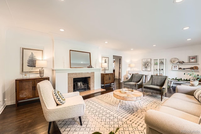 3695 E Dartmouth Ave, Denver, CO 80210 - living area with wood finished floors, a high end fireplace, and recessed lighting