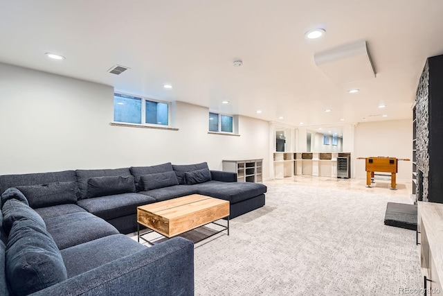 3695 E Dartmouth Ave, Denver, CO 80210 - living room with recessed lighting and beverage cooler