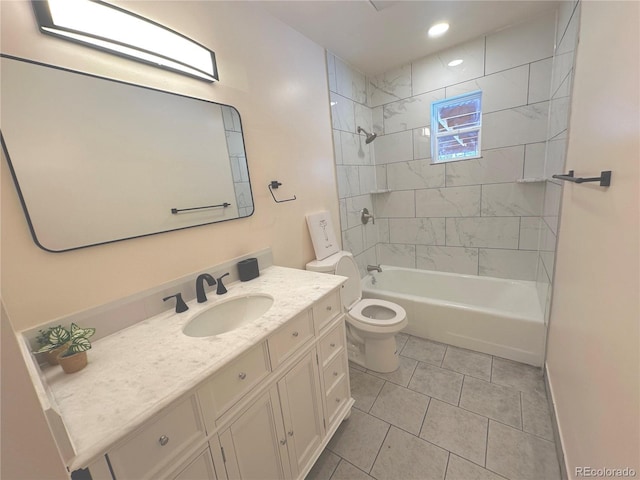 full bathroom with tiled shower / bath combo, vanity, tile patterned flooring, and toilet