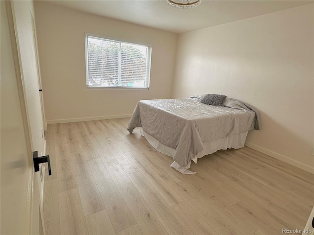 bedroom featuring light hardwood / wood-style floors