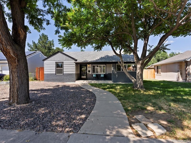 1785 Geneva St, Aurora, CO 80010 - single story home with brick siding