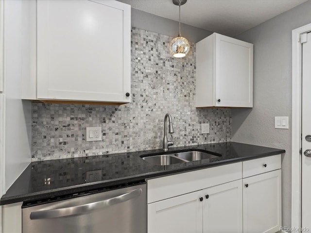 1785 Geneva St, Aurora, CO 80010 - kitchen with dishwasher, decorative backsplash, white cabinets, and decorative light fixtures