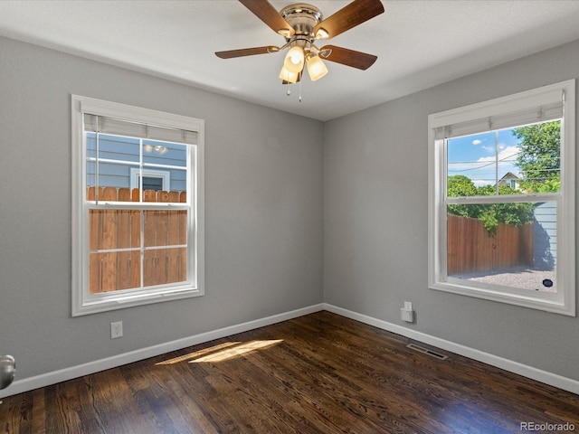 1785 Geneva St, Aurora, CO 80010 - empty room featuring dark wood-type flooring and ceiling fan
