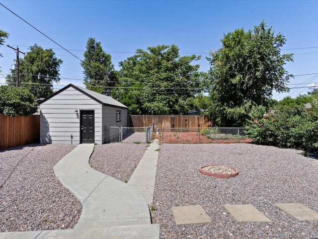 1785 Geneva St, Aurora, CO 80010 - fenced backyard featuring an outdoor structure