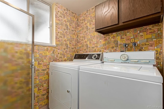 519 N Columbine St, Golden, CO 80403 - washroom with washer and dryer and cabinet space