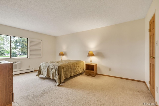 13952 E Marina Dr Unit 102, Aurora, CO 80014 - carpeted bedroom with a baseboard radiator, a textured ceiling, and a wall mounted air conditioner