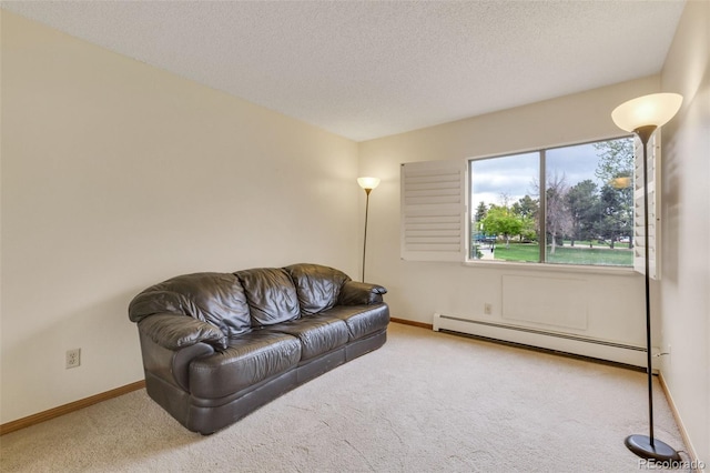 13952 E Marina Dr Unit 102, Aurora, CO 80014 - carpeted living room featuring baseboard heating and a textured ceiling