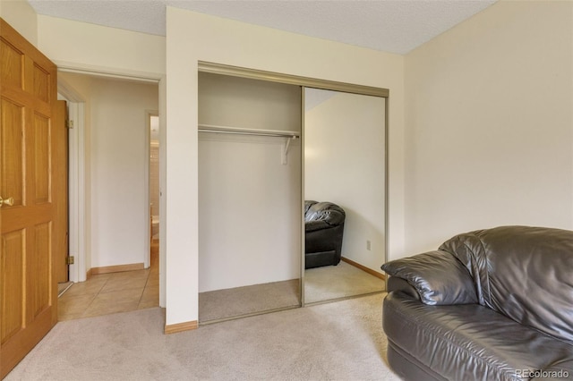 13952 E Marina Dr Unit 102, Aurora, CO 80014 - living area featuring light colored carpet
