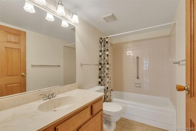 13952 E Marina Dr Unit 102, Aurora, CO 80014 - bathroom with tile patterned floors, vanity, and shower / bath combo