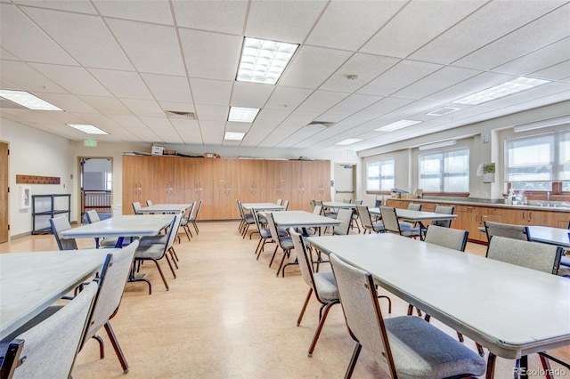 13952 E Marina Dr Unit 102, Aurora, CO 80014 - dining area featuring light flooring and a paneled ceiling
