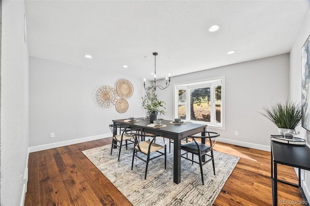 2357 Oak Ridge Rd, Sedalia, CO 80135 - dining room featuring recessed lighting, wood finished floors, and a chandelier