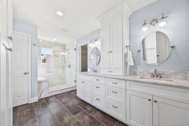 2357 Oak Ridge Rd, Sedalia, CO 80135 - bathroom featuring double vanity and a marble finish shower