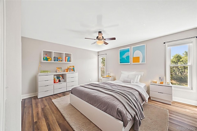2357 Oak Ridge Rd, Sedalia, CO 80135 - bedroom featuring wood finished floors and ceiling fan