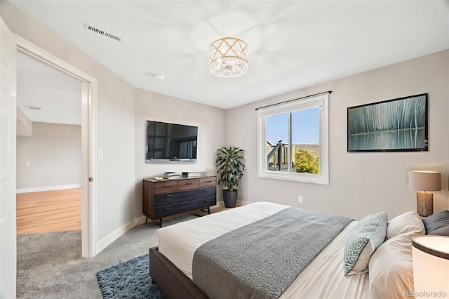 2357 Oak Ridge Rd, Sedalia, CO 80135 - bedroom featuring carpet flooring and baseboards