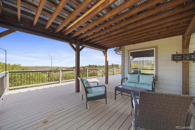 2357 Oak Ridge Rd, Sedalia, CO 80135 - deck featuring an outdoor living space