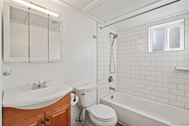 full bathroom featuring  shower combination, vanity, and toilet