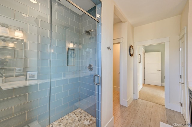 bathroom with vanity and an enclosed shower