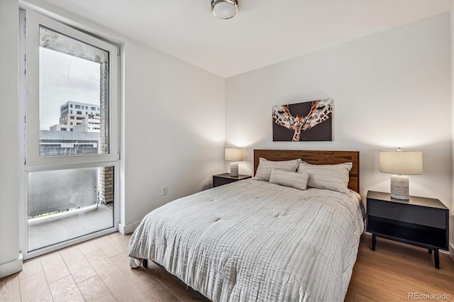 bedroom featuring hardwood / wood-style floors