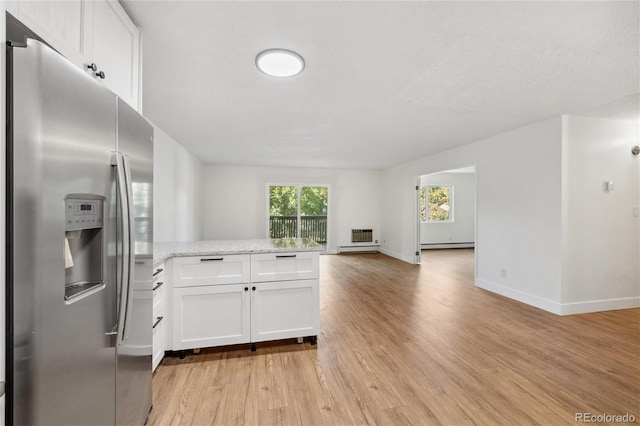 kitchen featuring light stone countertops, baseboard heating, stainless steel refrigerator with ice dispenser, light hardwood / wood-style floors, and white cabinets