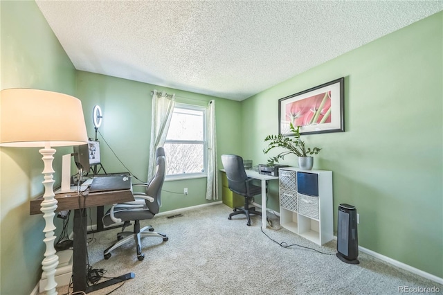 8150 W Calhoun Dr, Littleton, CO 80123 - office space featuring a textured ceiling, carpet floors, and baseboards
