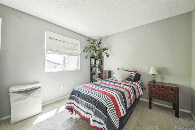 8150 W Calhoun Dr, Littleton, CO 80123 - carpeted bedroom featuring a textured ceiling and baseboards