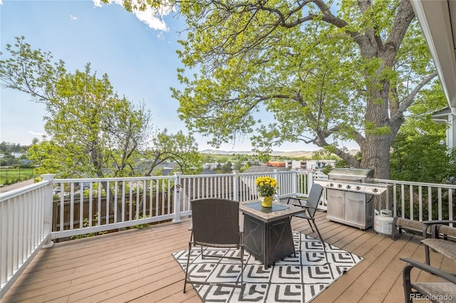 8150 W Calhoun Dr, Littleton, CO 80123 - wooden terrace with a grill