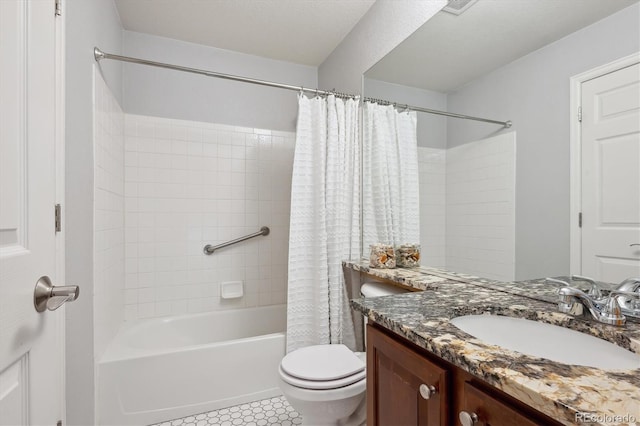 full bath featuring vanity, tile patterned floors, toilet, and shower / tub combo with curtain